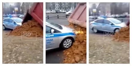 Водитель КамАЗа засыпал песком остановивший его полицейский патруль